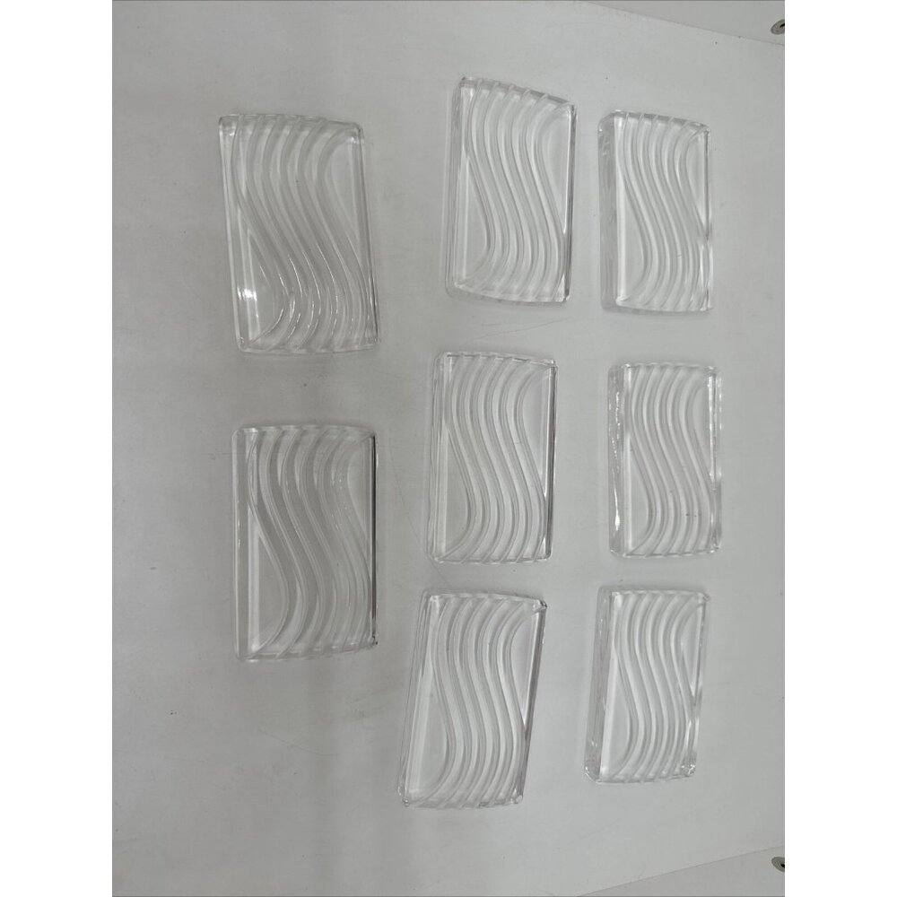 Crystal Lalique Leda knife rest with rectangular form, wave motif Set Of 8